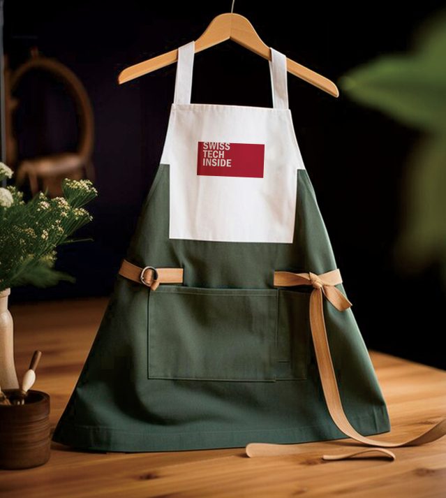 Green kitchen apron with House Linen Bali Swiss Tech Inside tag